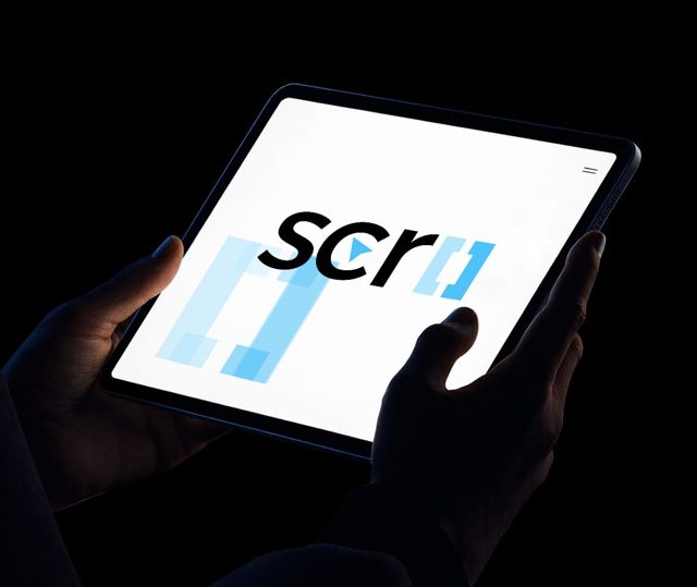 The ScrollEstore app on a tablet held in two hands